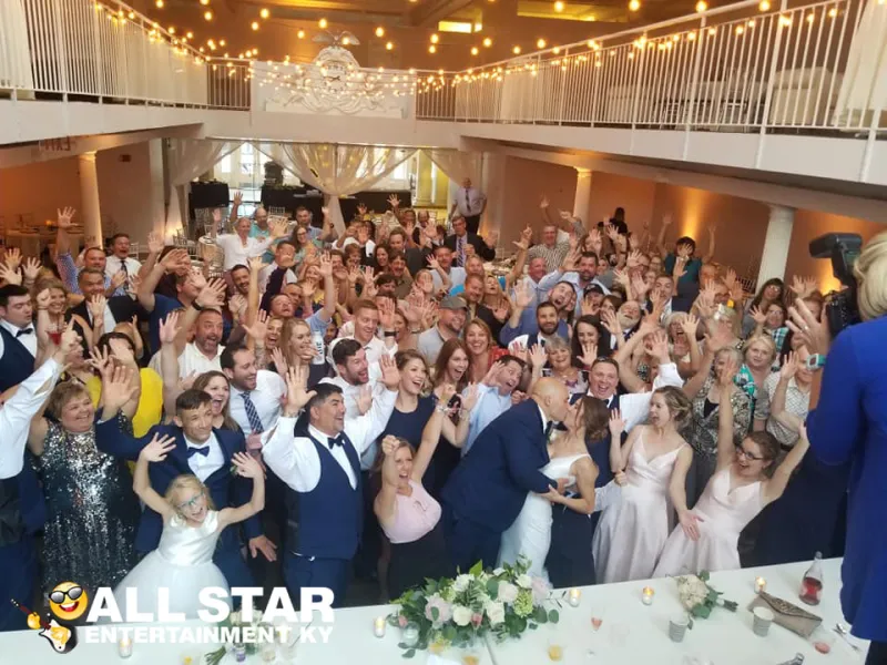 Wedding reception crowd cheering