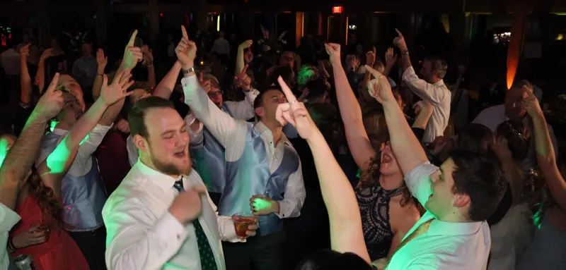 All Star Entertainment lighting up a packed reception dance floor